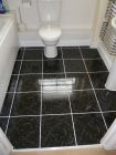 finished tiled floor in bathroom